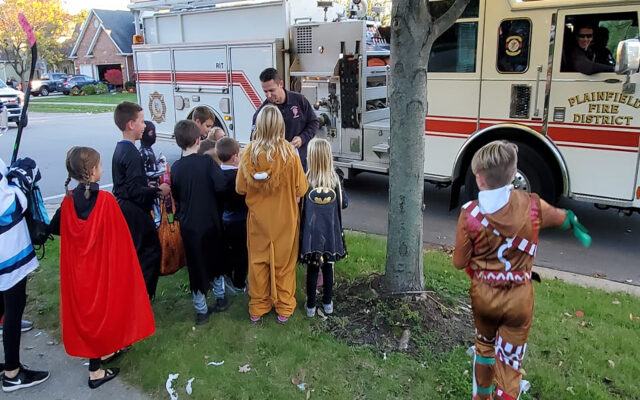 Plainfield Fire Fighters Passing Out Halloween Candy