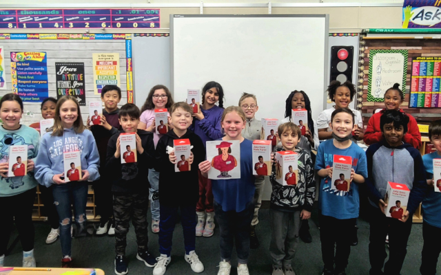 Why State Farm Sent Plainfield Fourth Graders “Jake From State Farm” Bobbleheads
