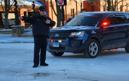 HAPPY HOUR: Local Police Chief Directing Traffic in Single-Digit Cold